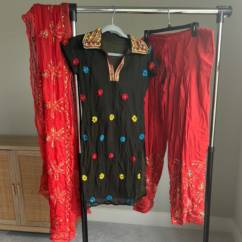Colorful Embroidered Black Kurti with Red Dupatta and Pants